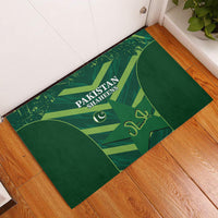 Green rubber cricket doormat with Pakistan Shaheens text and star-and-crest graphic