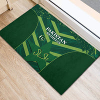 Green rubber cricket doormat with Pakistan Shaheens emblem and Urdu-style script graphic