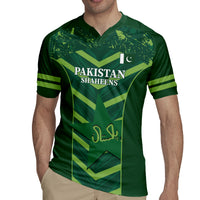 Green Pakistan Shaheens cricket jersey, v-neck, short sleeves, front star graphic and stripes