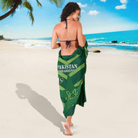 Green Pakistan Shaheens graphic sarong tied at the waist, ankle-length