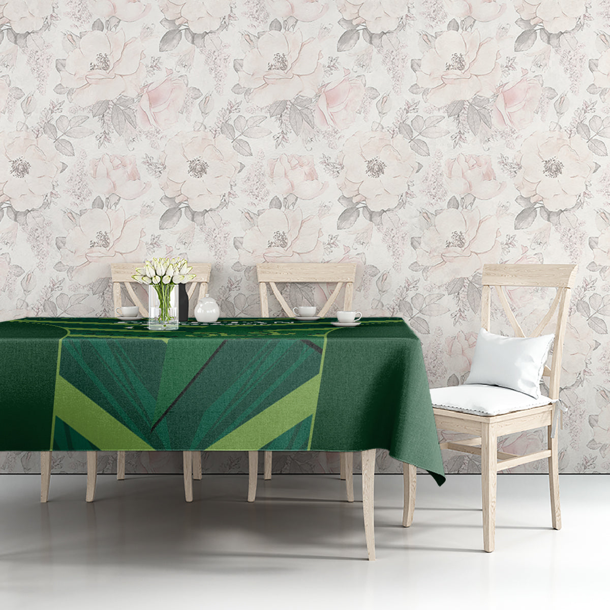 Green tablecloth with geometric fan pattern on dining table, rectangular cover
