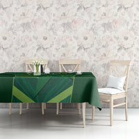 Green tablecloth with geometric fan pattern on dining table, rectangular cover