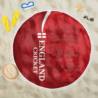 Red circular cricket beach blanket with England text, lion pattern, and fringed edge