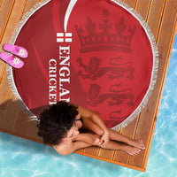 Red circular cricket beach blanket with England text and crown-lion graphic, fringed edge