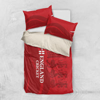 Red bedding set with duvet and two pillowcases, England cricket logo and crown/lion print