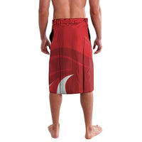 Red cricket lavalava shorts with white wave graphic and emblem