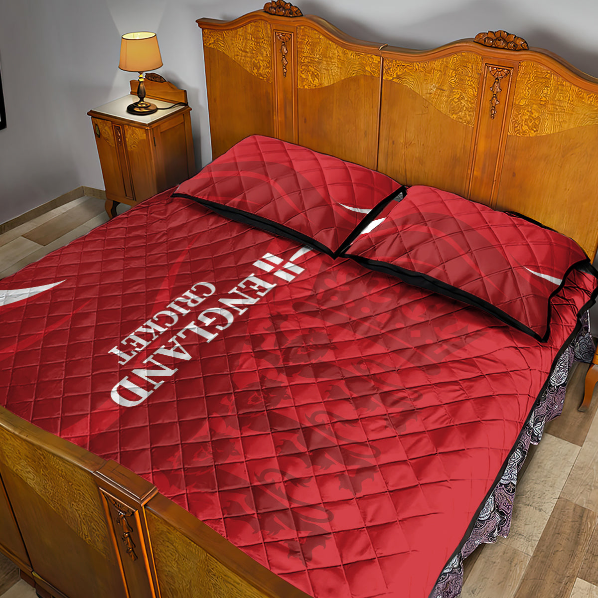Red quilt bed set with diamond stitching and white England Cricket logo, plus two pillows