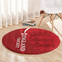 Red round England Cricket rug with crown and lions pattern, white “CRICKET” vertical text