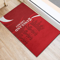 Red rubber doormat with England Cricket crest and white curved stripe