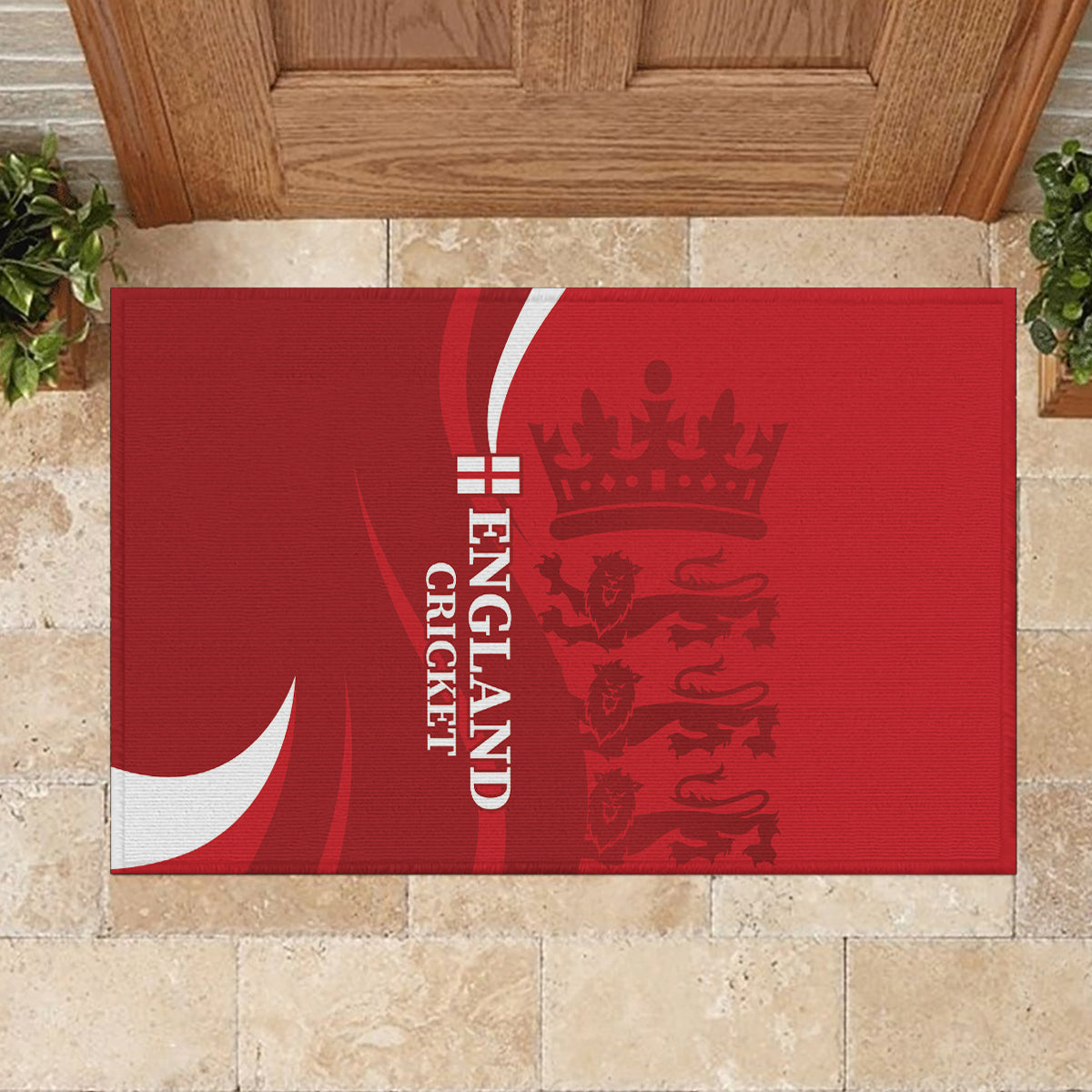 Red rubber doormat in front of door with England Cricket crest