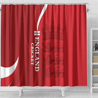 Red shower curtain with England cricket lion crest, white flag curve, and hanging top rod