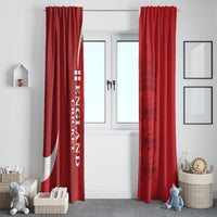 Red England cricket curtains flanking a door, white vertical text and crest on inner panel