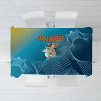 Blue cricket tablecloth flat lay with 'SRI LANKA CRICKET' text and line pattern