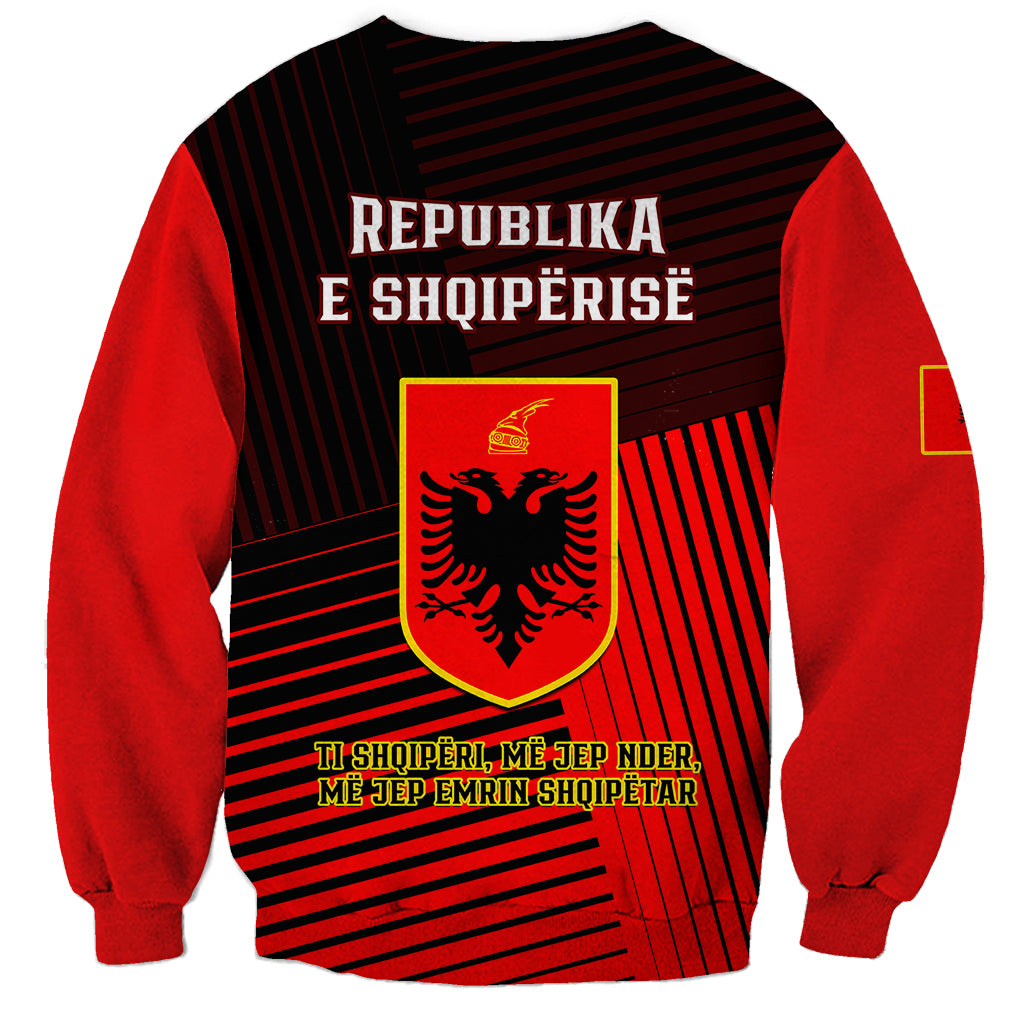 Unisex red-and-black striped sweatshirt coat with back coat of arms crest and text