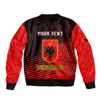 Red and black bomber jacket with rear crest and "YOUR TEXT" panel, full zip