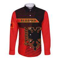 Long sleeve button shirt with red sleeves and striped black-red front, crest graphic