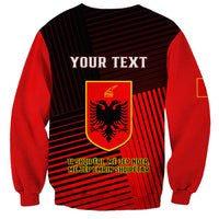 Red and black striped sweatshirt with shield crest and 'YOUR TEXT' panel