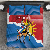 Overhead view of duvet cover with deer flag graphic and “Your Text”, red blue white