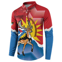 Red and blue long-sleeve button sweatshirt with Antigua flag graphic and antelope illustration.