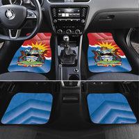 Car mats set in car interior: Antigua flag deer art with red 'YOUR TEXT' on front mats