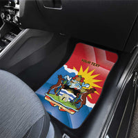 Car mat on passenger seat with Antigua flag deer graphic and red 'YOUR TEXT' text