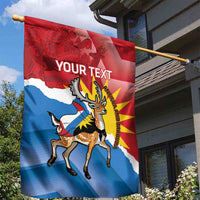 Red and blue fallow deer personalized garden flag close view on brass pole