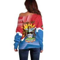Women's off-shoulder sweater back view with 'YOUR TEXT' and central deer emblem, flag