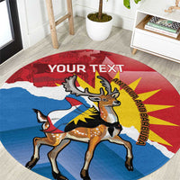 Round red-blue rug with deer and Antigua and Barbuda flag, “YOUR TEXT”