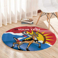 Round flag rug with deer and “YOUR TEXT” headline, Antigua and Barbuda colors