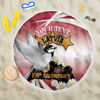 Round beach blanket with white fringe, red Latvia graphic with bird and flowers