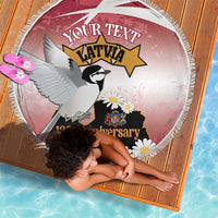 Round beach blanket with white fringe, bird and 106th Anniversary Latvia design