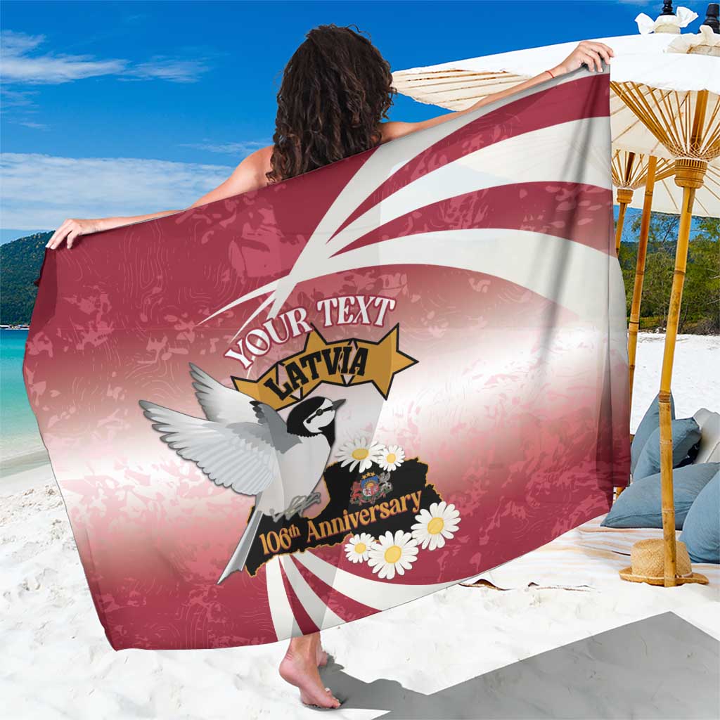 Red and white Latvia-themed sarong close-up with 'Your text Latvia', eagle and 106th anniversary