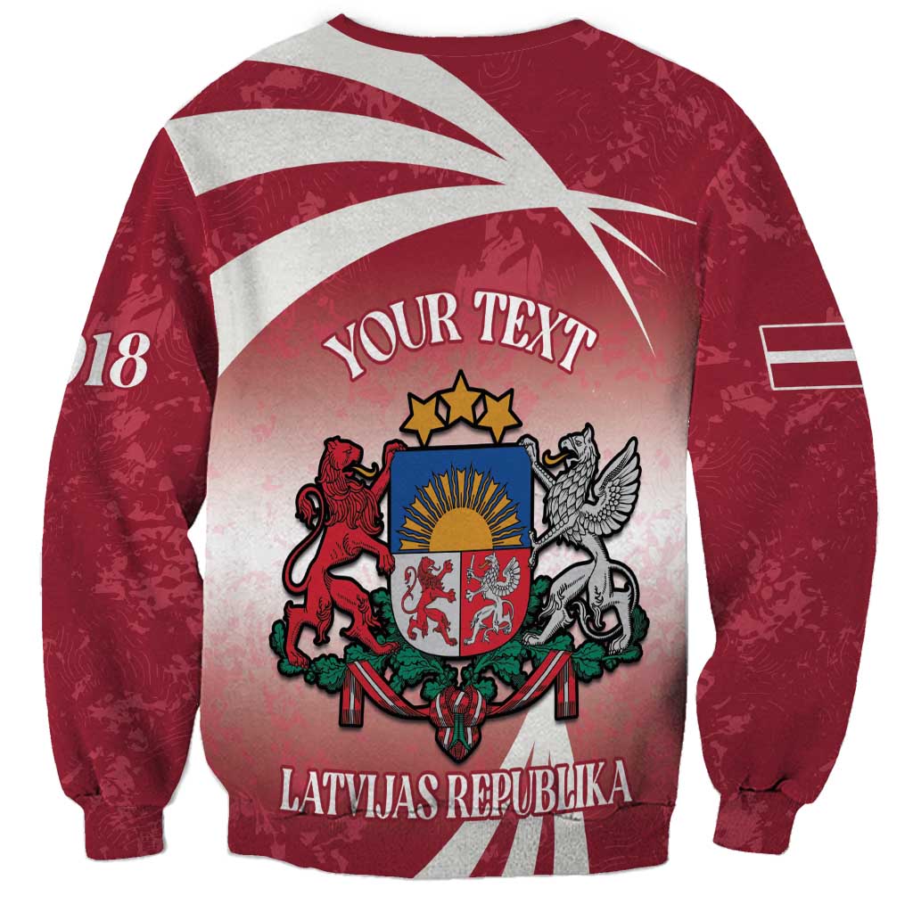 Red crewneck sweatshirt back with white stripes, coat of arms, 'YOUR TEXT' and Latvijas Republika