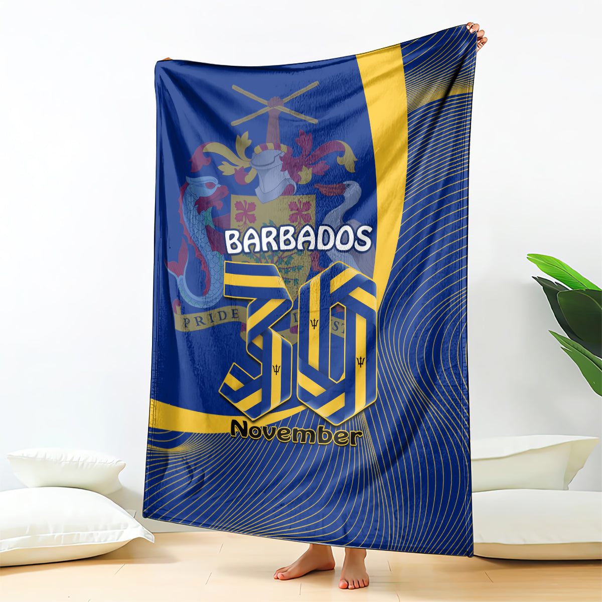 Blue blanket with yellow stripe and Barbados crest graphic, 'November' text.