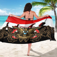 Yemen-themed sarong with red, white, and black coat-of-arms graphic, spread wide