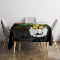 Black tablecloth with Palestinian flag-style coat of arms and Arabic text print