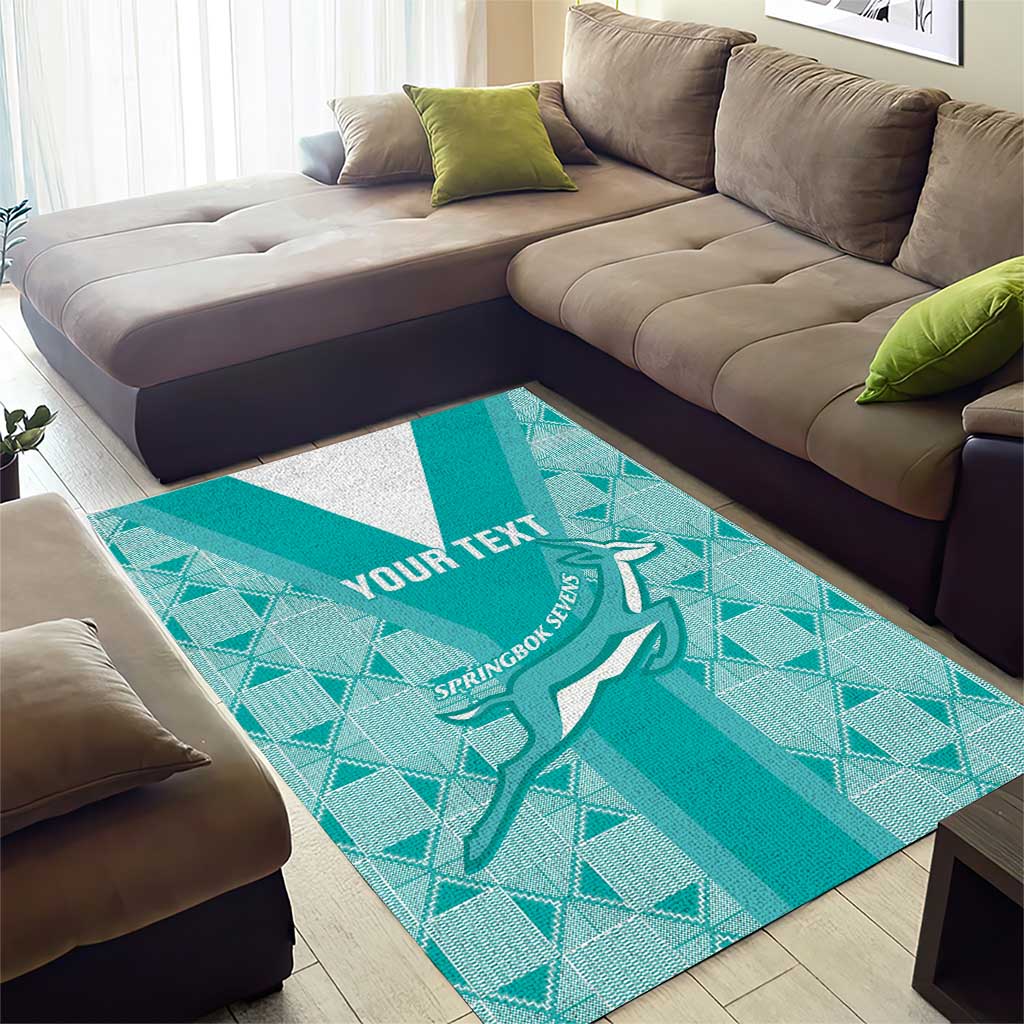 Teal area rug with geometric grid, bold white stripe, springbok emblem, 'YOUR TEXT'