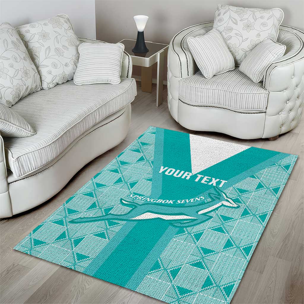 Teal geometric area rug with white band and springbok sevens emblem, 'YOUR TEXT'