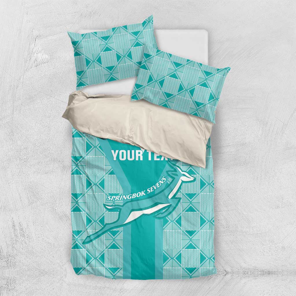 Teal bedding set with duvet and two matching pillowcases, geometric pattern