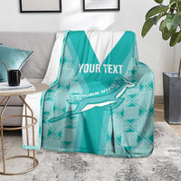 Teal custom rugby blanket on floor with white V stripe, Springbok graphic and "YOUR TEXT"
