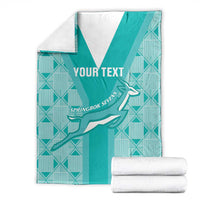 Teal custom rugby blanket folded with white V stripe, Springbok graphic, "YOUR TEXT"