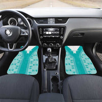 Teal custom-fit car floor mats with geometric pattern and center stripe, front cabin view