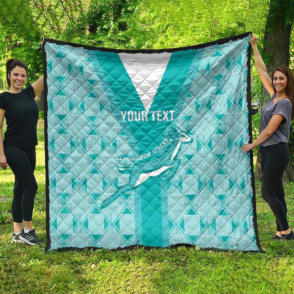Teal and white rugby quilt featuring diamond pattern, “YOUR TEXT,” and rugby player