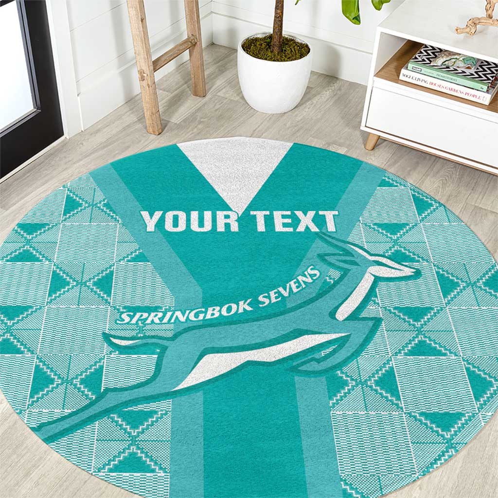 Teal round rugby rug with diamond pattern and Springbok graphic, custom text banner