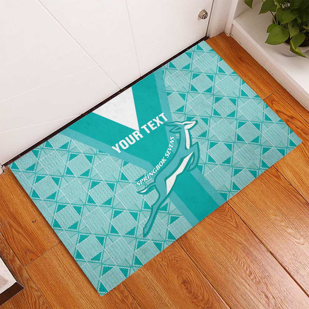 Teal rubber rugby doormat with diamond pattern, Springbok silhouette and custom text