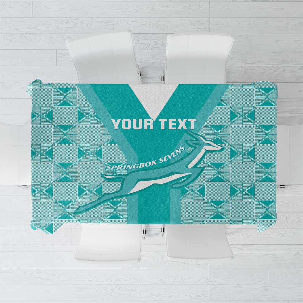 Teal rugby tablecloth with geometric diamond pattern and springbok graphic