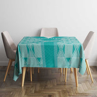 Teal rugby tablecloth with central stripe and diamond motif on square table