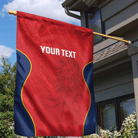 Custom red rugby garden flag on wooden pole, blue wavy trim, 'YOUR TEXT' and lion art