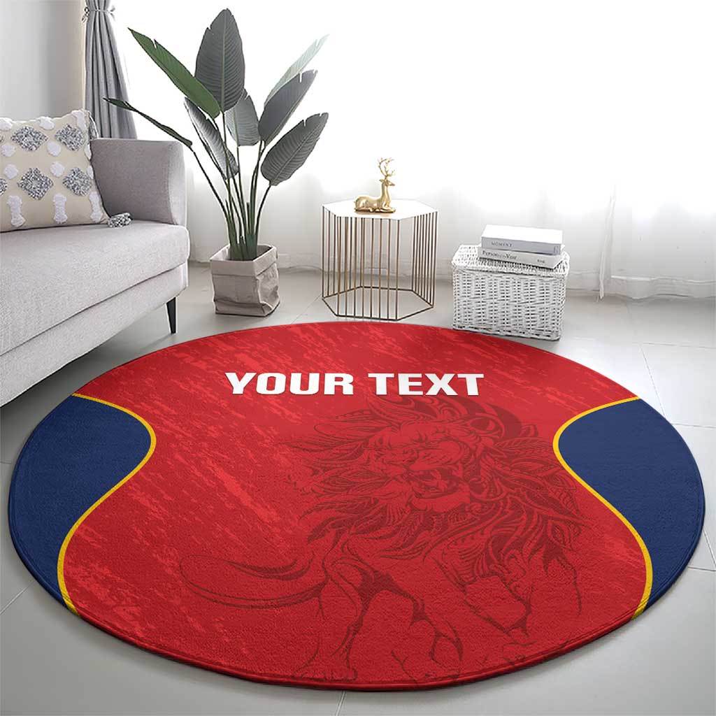 Round red rug with navy side panels and ornate pattern, centered "YOUR TEXT" lettering