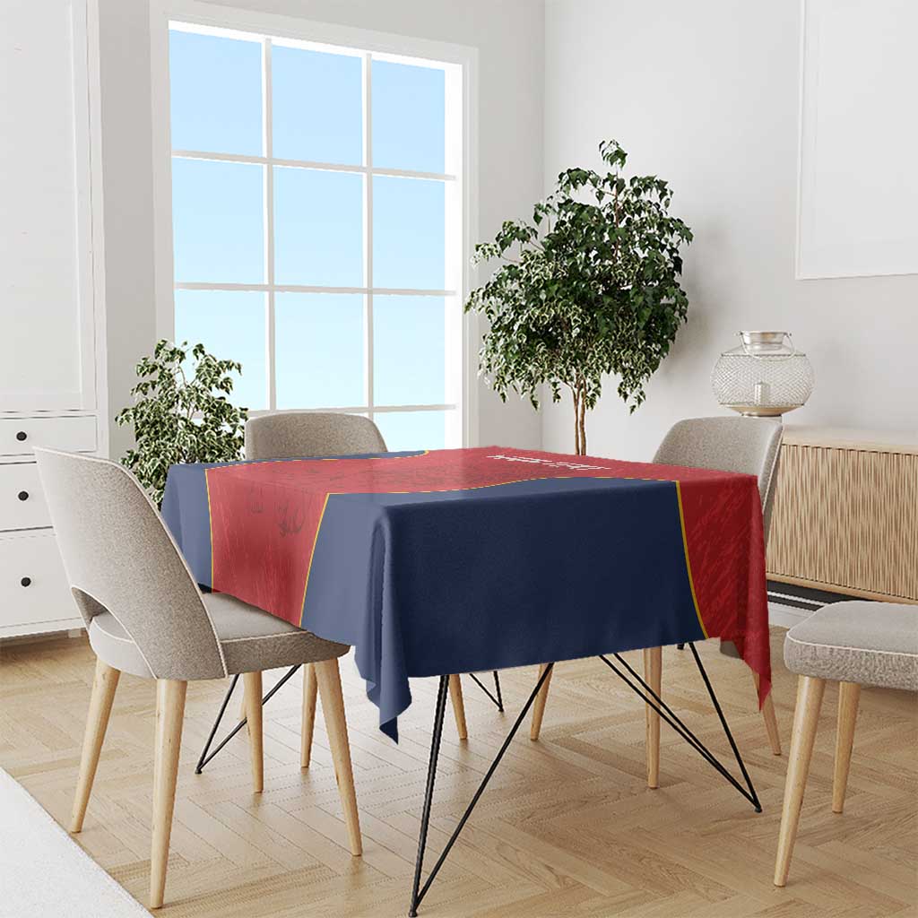 Custom dining tablecloth with red center, navy sides, and yellow accent border